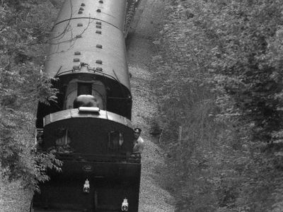 June 22nd 1986 Pictured coasting down through the cutting bunker first towards Maesdown Road Bridge is Jinty with the late Dave Massey at the controls. He was and ex SD driver for many years.